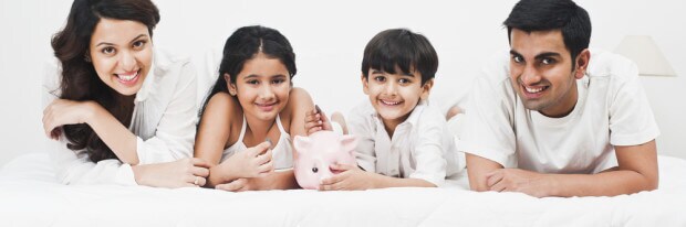 COST family lying on bed shutterstock